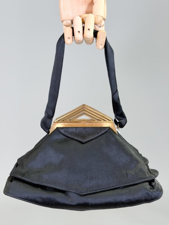 Vintage 1940s Silk Satin Art Deco Evening Bag: Vintage 1940s Silk Satin Art Deco Evening Bag Purse having metal frame lock closure and top handle. Measuring approximately 5 inches high by 11 inches wide by 5 inches deep. From the lifetime collecti