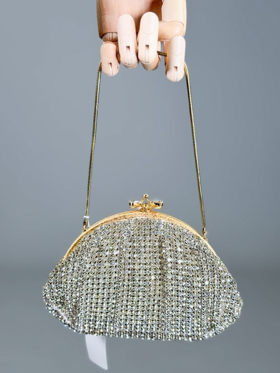 Vintage 1950s Rhinestone Crystal Evening Bag: Vintage 1950s Rhinestone Crystal Evening Bag having metal frame lock closure with chain strap. Measuring approximately 5 inches high by 7 inches wide by 1.5 inches deep. From the lifetime collection, 
