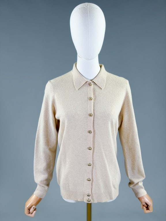 Vintage 1960s Jaeger Wool knit Cardigan Sweater: Vintage 1960s Jaeger Wool knit Cardigan Sweater having button front closure and stretch throughout. Measuring 40-46 inch bust, 25 inches long, 25 inch sleeve length. From the lifetime collection, fash