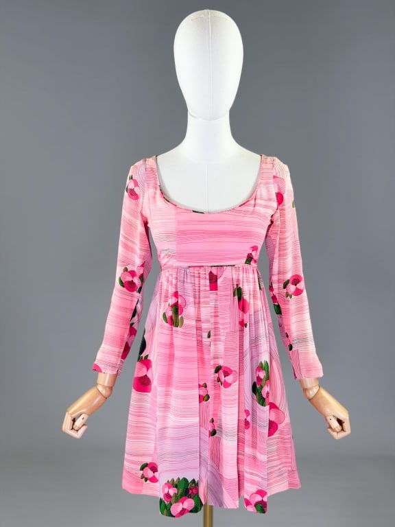 Vintage 1960s Saks Fifth Avenue Silk Dress: Vintage 1960s Saks Fifth Avenue Silk Dress having back zip closure and empire waistline. Marked size 6. Measuring 32 inch bust, 26 inch waist, 33 inches long, 21 inch sleeve length. From the lifetime 