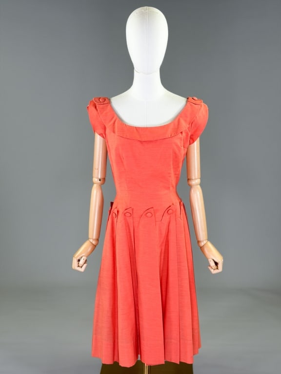 Vintage 1960s Boat Neck Button Day Dress: Vintage 1960s Boat Neck Button Day Dress having center back zip closure. Measuring 38 inch bust, 27 inch waist, 40 inches long. From the lifetime collection, fashion archive and business inventory of 
