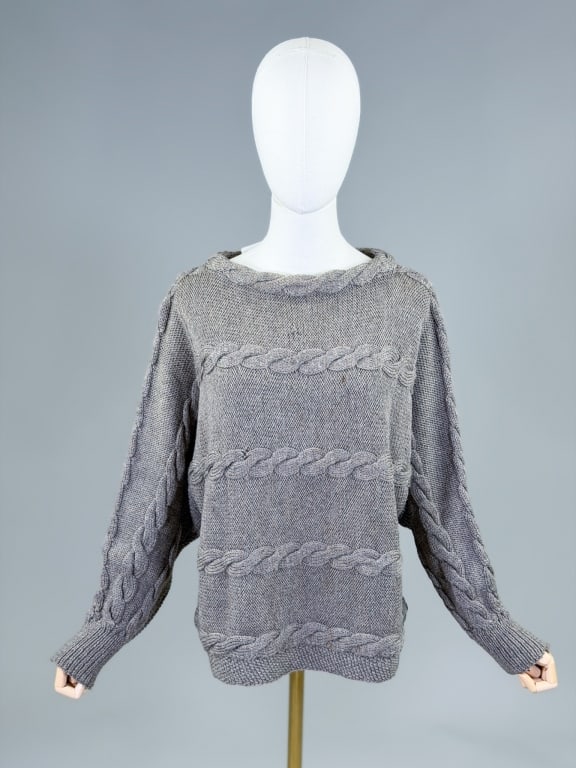 Vintage 1970s Wool Cable Knit Sweater Top: Vintage 1970s Wool Cable Knit Sweater Top having stretch throughout. Measuring free bust, 24 inches long, 24 inch sleeve length. General wear as shown throughout. From the lifetime collection, fashion