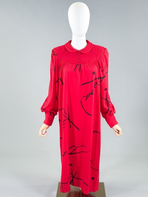 Vintage 1970s Christian Rupert Printed Knit Dress: Vintage 1970s Christian Rupert Printed Knit Dress having button closure at neck. Marked size 12 with stretch throughout. Measuring 44-54 inch bust, 42-48 inch waist, 44 inches long, 24 inch sleeve len