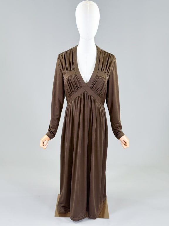 Vintage 1970s Robert David Morton Knit Dress: Vintage 1970s Robert David Morton Knit Dress having center back zip closure and draped details throughout. Measuring 40-46 inch bust, 30-34 inch waist, 48 inches long, 24 inch sleeve length. From the 