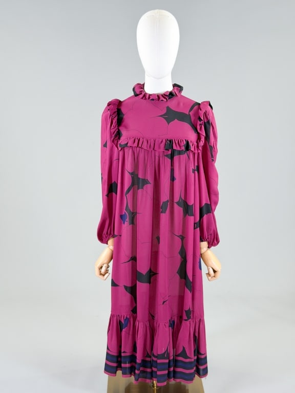 Vintage 1970s Leaf Print Crepe Peasant Dress: Vintage 1970s Leaf Print Crepe Peasant Dress having back neck button closure. Measuring 34-46 inch bust, free waist, 43 inches long, 23 inch sleeve length. From the lifetime collection, fashion archiv