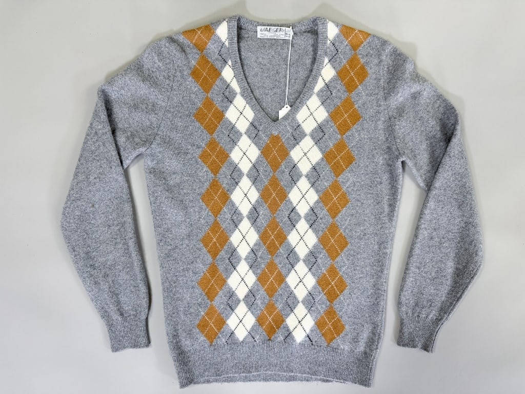 Vintage 1970s Jaeger Cashmere Knit Argyle Sweater: Vintage 1970s Jaeger Cashmere Knit Argyle Sweater having stretch throughout. Measuring 36-44 inch bust, 24 inches long, 25 inch sleeve length. From the lifetime collection, fashion archive and busines