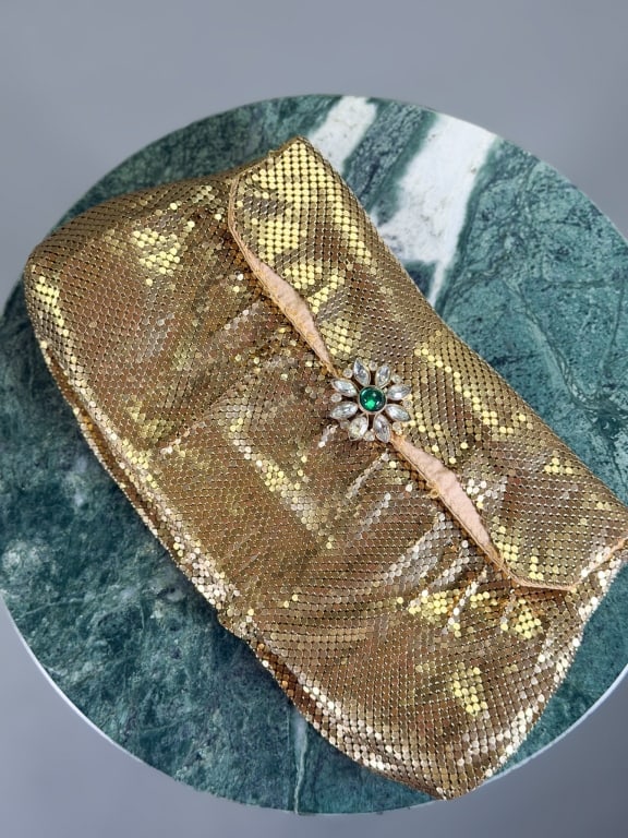 Vintage 1950s Whiting & Davis Metal Mesh Clutch: Vintage 1950s Whiting & Davis Metal Mesh Clutch having lock closure at front with rhinestone detail. Measuring approximately 6 inches high by 11 inches wide by 2 inches deep. General wear as shown thr