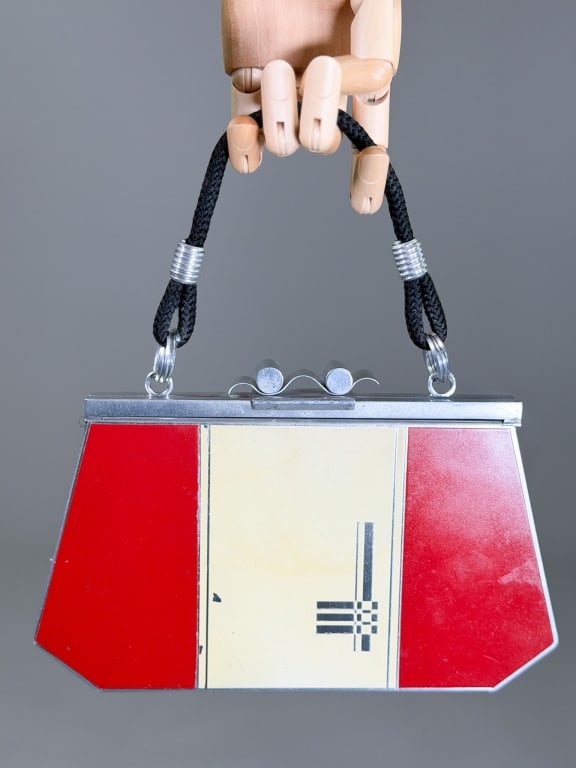 Vintage 1950s Metal Colorblock Evening Bag: Vintage 1950s Metal Colorblock Evening Bag having Metal frame closure with top lock. Measuring approximately 5.5 inches high by 9 inches wide by 2 inches deep. General wear as shown throughout. From t