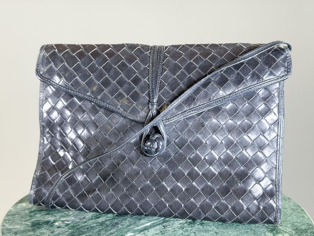 Vintage 1960s Morris Moskowitz Woven Purse Bag: Vintage 1960s Morris Moskowitz Woven Purse Bag having button loop closure with crossbody strap. Measuring approximately 6.5 inches high by 9 inches wide. From the lifetime collection, fashion archive 