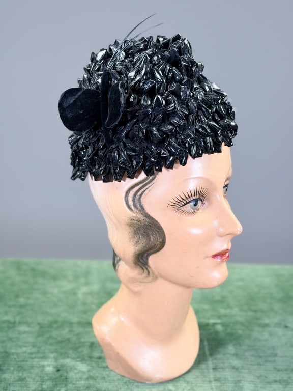 Vintage 1960s Raffia Butterfly Beehive Hat: Vintage 1960s Raffia Butterfly Beehive Hat. Labeled Saks Fifth Avenue Millinery Salon.Interior circumference measuring approximately 20.5 inches. From the lifetime collection, fashion archive and busi