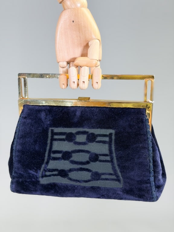 Vintage 1970s Mazzini Velvet Burn Out Purse Bag: Vintage 1970s Mazzini Velvet Burn Out Purse Bag having metal handle and frame closure with interior pocket. Measuring approximately 7 inches high by 9 inches wide by 3 inches deep. From the lifetime c
