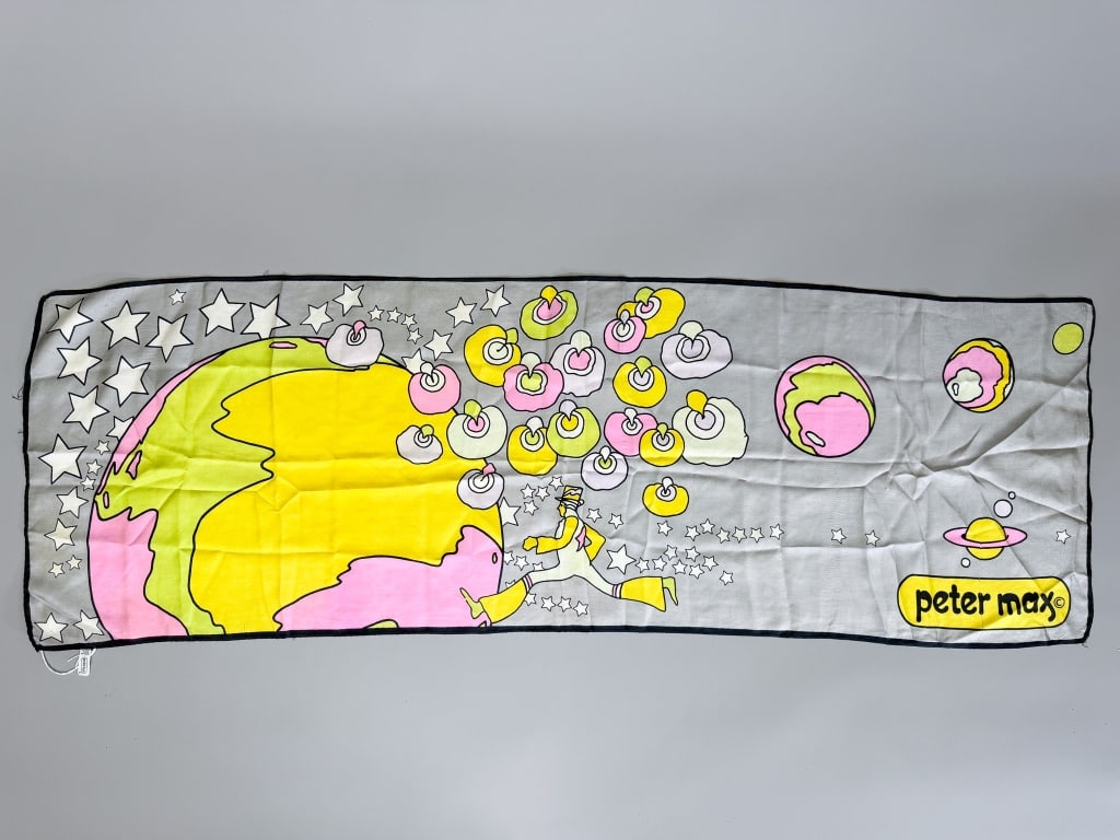 Vintage 1970s Peter Max Silk Printed Neck Scarf: Vintage 1970s Peter Max Silk Printed Neck Scarf having print throughout with hand rolled edges. Measuring approximately 42 inches by 14 inches. General wear as shown throughout. From the lifetime coll