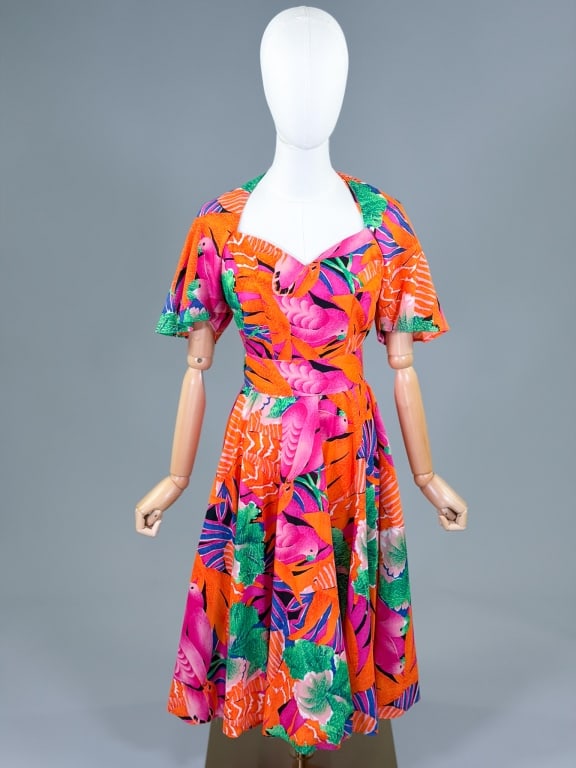 Vintage 1980s Floral Cotton Tropical Print Dress: Vintage 1980s Floral Cotton Tropical Print Dress having back neck tie, back zip closure and belt at waist. Measuring 34 inch bust, 26 inch waist, 44 inches long, 10 inch sleeve length. From the lifeti