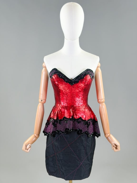 Vintage 1980s Fabrice Beaded Strapless Dress: Vintage 1980s Fabrice Beaded Strapless Dress having beaded sequin and quilted details throughout with center back zip closure. Marked size 6. Measuring 34 inch bust, 26 inch waist, 29 inches long. Fro
