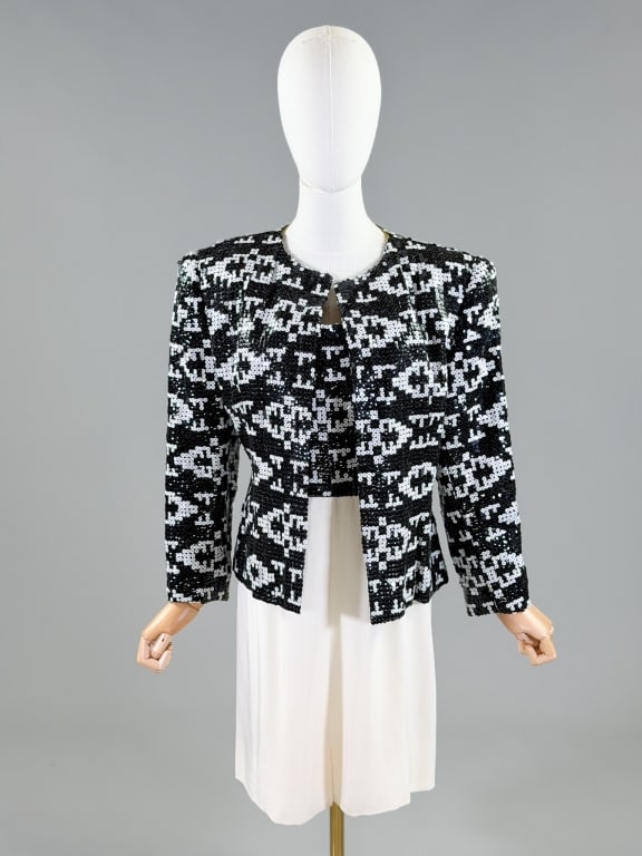 Vintage 1980s Arnold Scaasi Sequin 2 PC Dress Set: Vintage 1980s Arnold Scaasi Sequin 2 PC Dress Set. Strapless dress measuring 38 inch bust, 30 inch waist, 29 inches long. Jacket measuring 23 inches long, 22 inch sleeve length. From the lifetime coll
