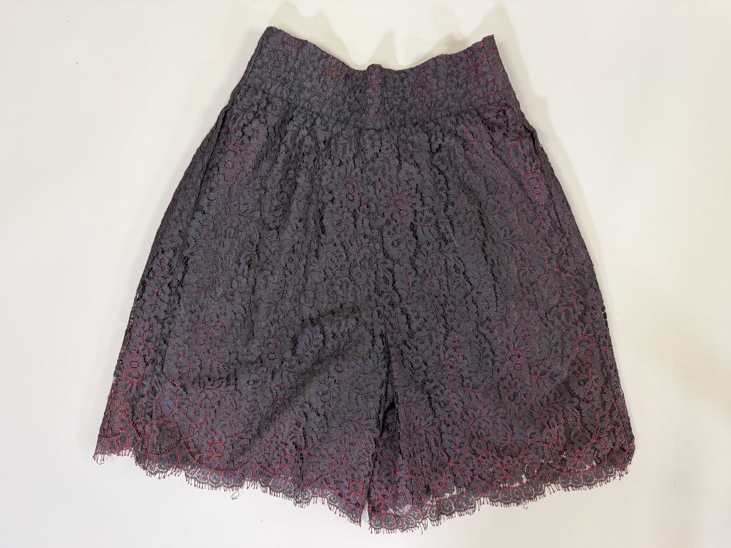 Vintage 1980s Tina Hagen Lace Culottes Shorts: Vintage 1980s Tina Hagen Lace Culottes Shorts having button front closure. Marked size M. Measuring 26 inch waist, 15 inch rise, 8 inch inseam. From the lifetime collection, fashion archive and busine