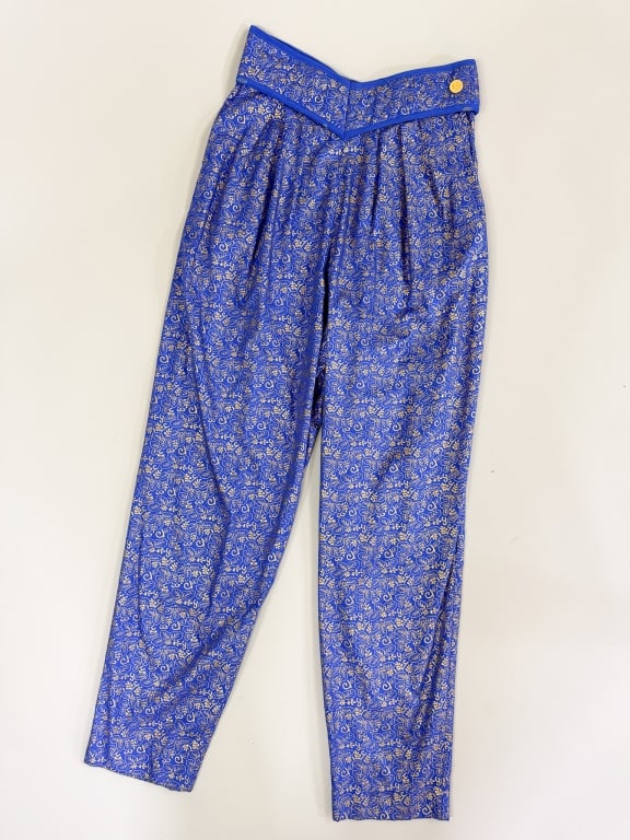 Vintage 1980s Jeanne Marc Printed Metallic Pants: Vintage 1980s Jeanne Marc Printed Metallic Trousers Pants having button and elastic waist closure. Marked size 8/10. Measuring 26-30 inch waist, 14 inch rise, 30 inch inseam. General wear as shown thr