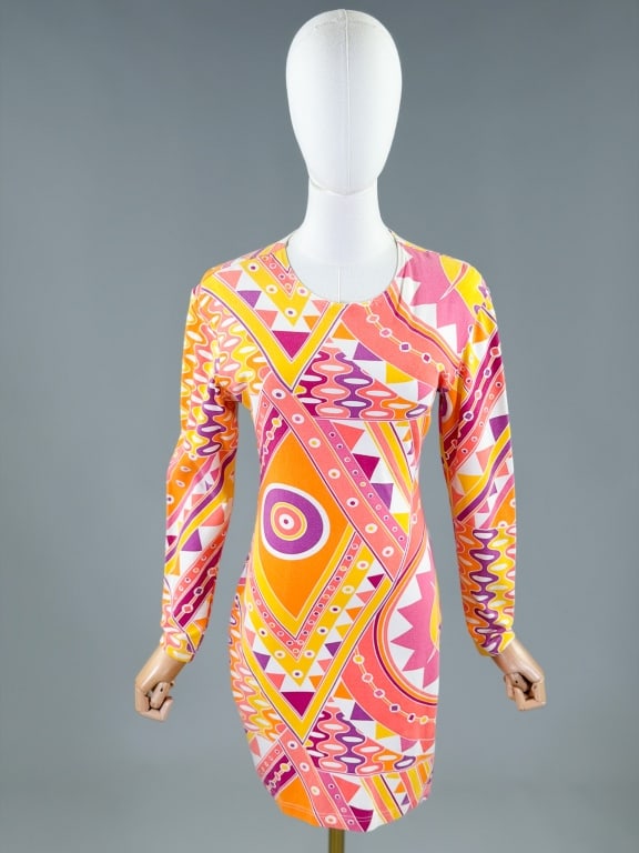 Vintage 1980s Tapemeasure Knit Jersey Print Dress: Vintage 1980s Tapemeasure Knit Jersey Print Dress having back zip closure and stretch throughout. Marked size Medium. Measuring 34-44 inch bust, 26-34 inch waist, 32 inches long, 22 inch sleeve length
