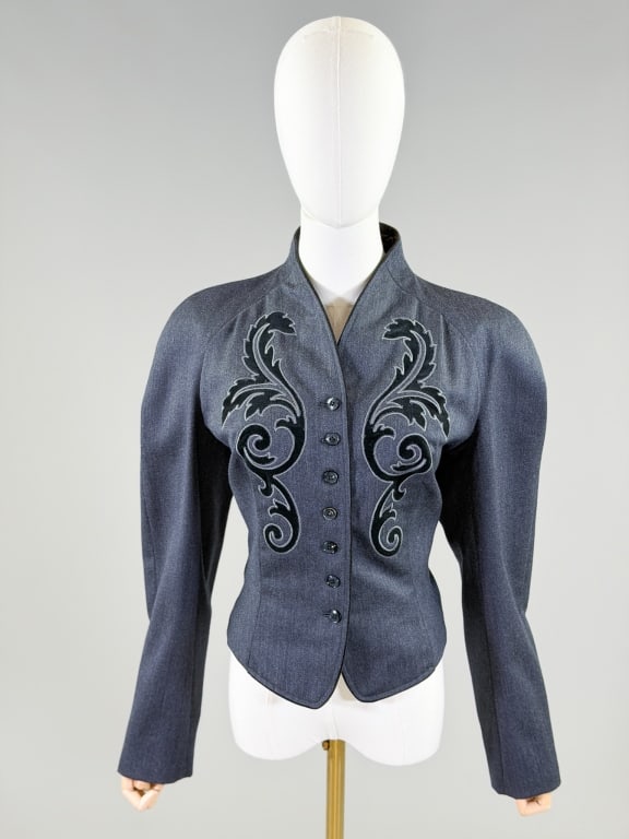 Vintage 1980s Kenzo Wool Velvet Blazer Jacket: Vintage 1980s Kenzo Wool Velvet Blazer Jacket having button front closure with velvet applique at front. Marked size 40, measuring 38 inch bust, 32 inch waist, 21 inches long, 24 inch sleeve length. F