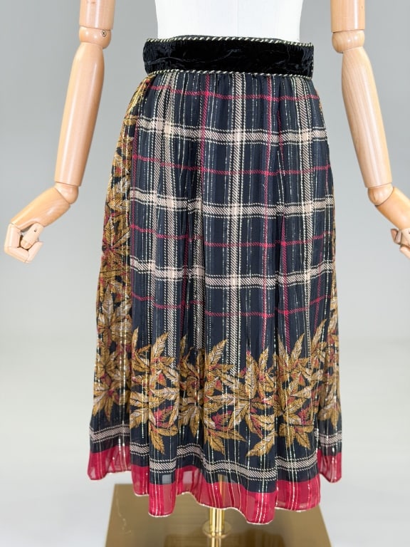 Vintage 1980s Silk Plaid Print Skirt: Vintage 1980s Silk Plaid Print Skirt having side zip closure. Marked size 42. Measuring 28 inch waist, 27 inches long. From the lifetime collection, fashion archive and business inventory of collector