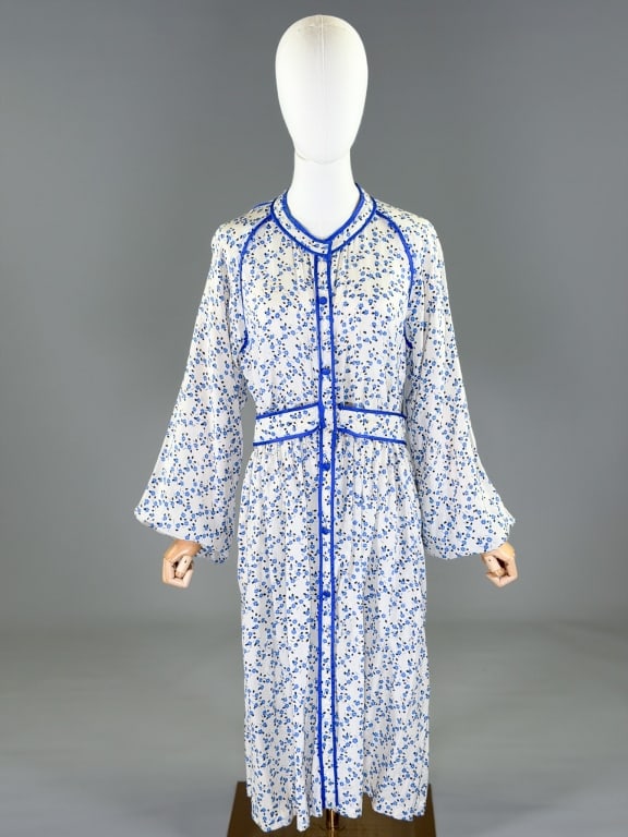 Vintage 1980s Indian Silk Floral Dress: Vintage 1980s Indian Silk Floral Dress having button front closure with belt at waist. Measuring 40 inch bust, 34 inch waist, 44 inches long, 26 inch sleeve length. General wear as shown throughout. F