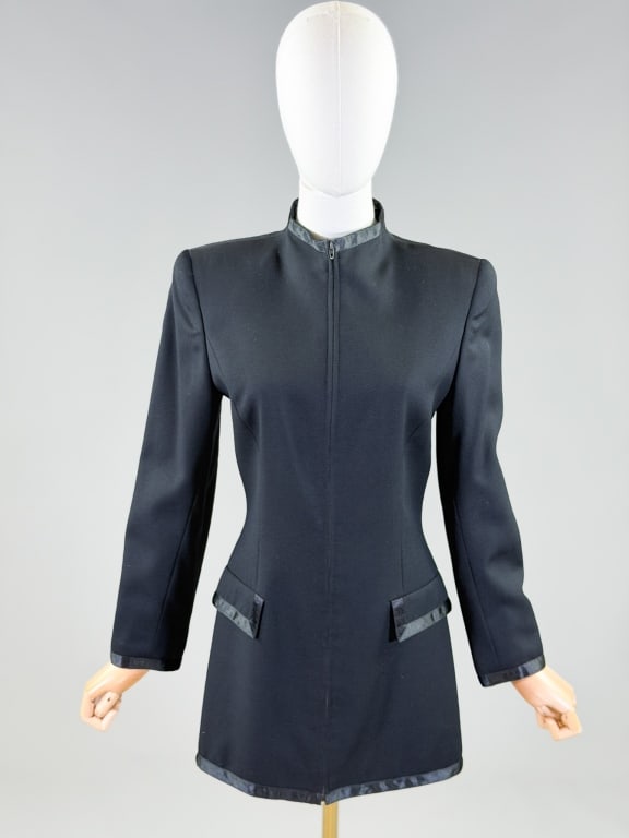 Vintage 1990s Claude Montana Zip Front Blazer: Vintage 1990s Claude Montana Zip Front Blazer Jacket having zip front closure with two front pockets. Marked size 40. Measuring 36 inch bust, 29 inch waist, 30 inches long, 23 inch sleeve length. From