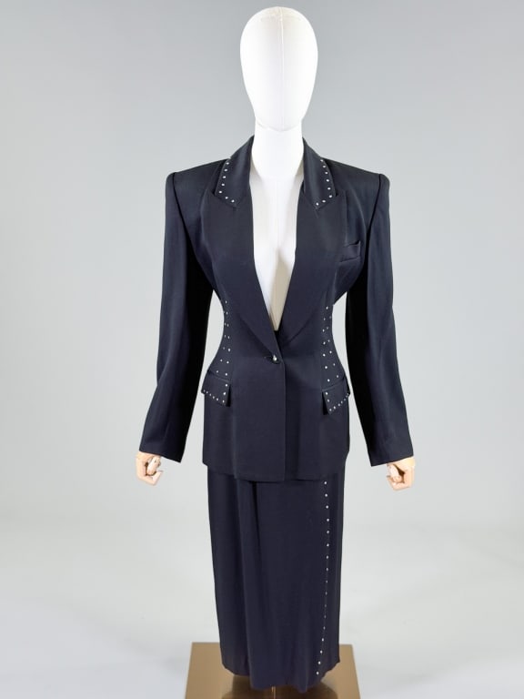 Vintage 1990s Cache Rhinestone Skirt Suit Set: Vintage 1990s Cache Rhinestone Skirt Suit Set with jacket having button front closure and two front pockets measuring 38 inch bust, 34 inch waist, 27 inches long, 24 inch sleeve length. Skirt with ela