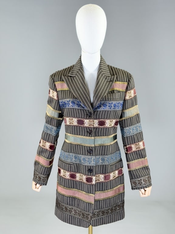Vintage 1990s Romeo Gigli Stripe Silk Blazer: Vintage 1990s Romeo Gigli Stripe Silk Blazer Jacket having button front closure and front pockets. Measuring 38 inch bust, 34 inch waist, 33 inches long. 23 inch sleeve length. From the lifetime colle
