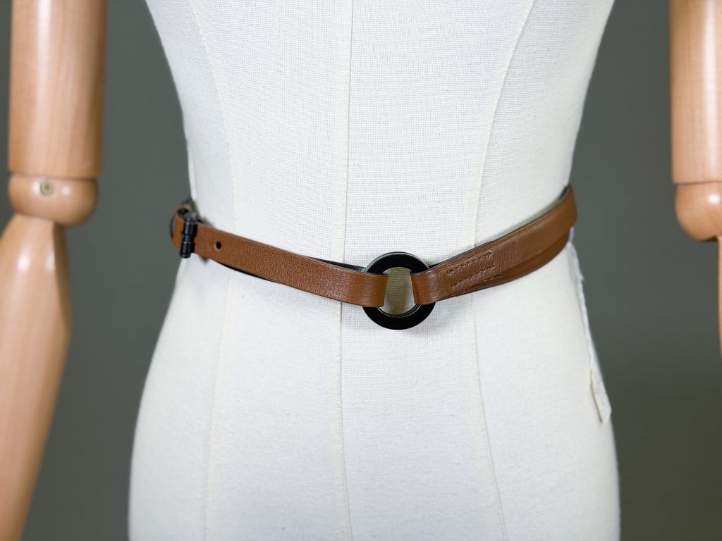 Vintage 1990s Leather Gucci Waist Belt: Vintage 1990s Leather Gucci Waist Belt. Marked size 34. Measuring approximately 44 inches total length. 32-34 inch waist. From the lifetime collection, fashion archive and business inventory of collec