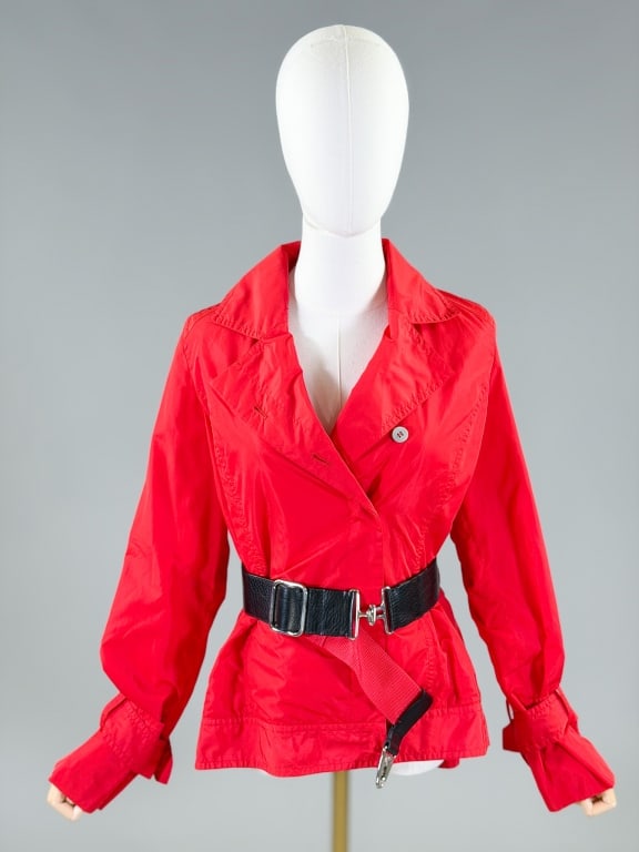 KaufmanFranco Nylon Belted Jacket: KaufmanFranco Nylon Belted Jacket with button front closure and belt at waist. Marked size 6/42. Measuring 40 inch bust, 24 inches long, 26 inch sleeve length. From the lifetime collection, fashion ar