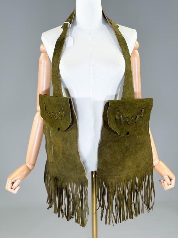 Vintage Suede Leather Fringe Saddle Bag: Vintage Suede Leather Fringe Saddle Bag having snap closure at both sides with fringed edges. Bag itself measuring approximately 19 inches high including fringe by 10 inches wide. Total length approxi