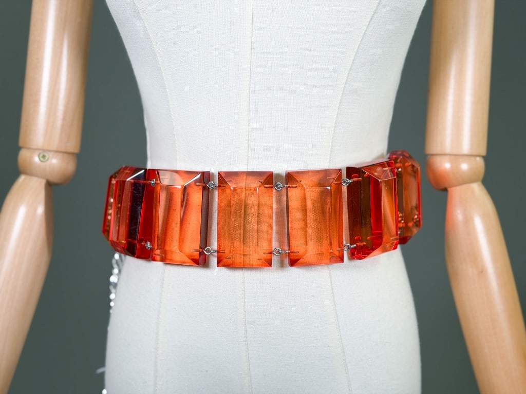 Vintage Judith Hendler Lucite Fasceted Chain Belt: Vintage Judith Hendler Lucite Fasceted Chain Belt having hook closure. Measuring approximately 39.5 inches total length. "Hendler, Los Angeles-born, began making jewelry from her husband's discarded a