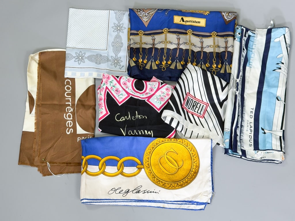 Group of Vintage Designer Silk Cotton Neck Scarves: Group of Seven Vintage Designer Silk Cotton Neck Scarves including Emilio Pucci, Ted Lapidus, Oleg Cassini, Norman, Carlton Varney, Aqua Scutum and Courreges in varying sizes with general wear as show