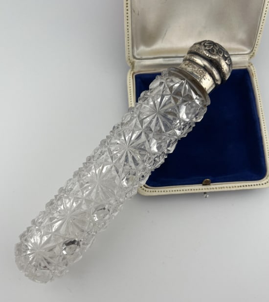 Antique 19th C Brilliant Crystal Sterling Perfume: Antique 19th C Brilliant Cut Crystal w Sterling Repousse Perfume Flask. Measures 6.5 inches in length. From the lifetime collection, fashion archive and business inventory of collector and dealer Elai