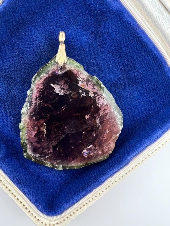 Estate 14kt Gold Watermelon Tourmaline Pendant: Estate 14kt Gold Watermelon Tourmaline Pendant. Necklace pendant with a large plaque of Maine watermelon tourmaline weighing over 90 carats. Setting acid tests for 14kt gold. Measures 2.25 inches in l