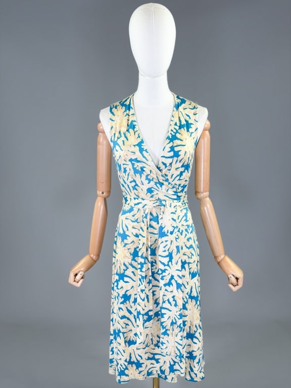 Vintage Diane Von Furstenberg Knit Wrap Dress: Vintage Diane Von Furstenberg Knit Wrap Dress having wrap tie waist, marked size 8. Measuring 34-36 inch bust, adjustable waist, 41 inches long.