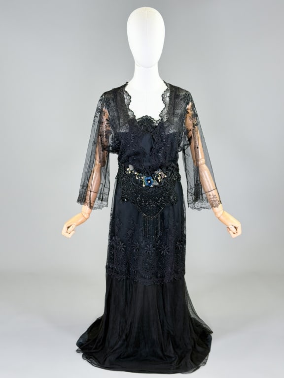 Antique Edwardian 1900s Silk Net Lace Beaded Gown: Antique Edwardian 1900s Silk Net Lace Beaded Gown having snap closures throughout with floral applique, beading and embroidery. Measuring 36 inch bust, 28 inch waist, 53 inches long, 19 inch sleeve le