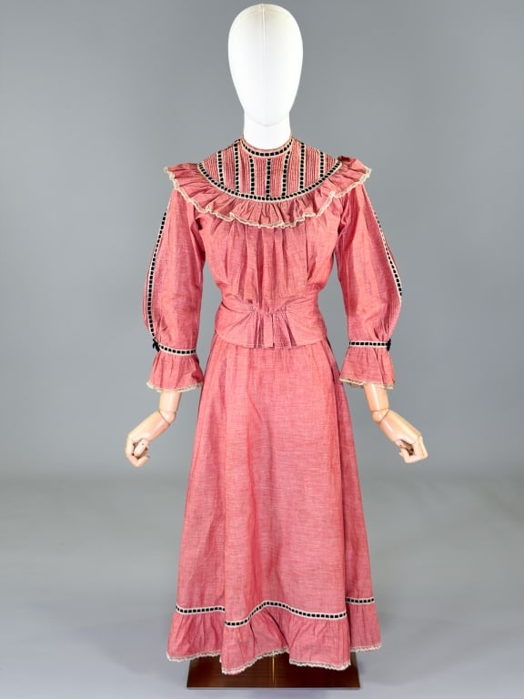 Antique Edwardian Cotton 2 PC Top & Skirt Set: Antique Edwardian Cotton Two Piece Top Skirt Set with top having lace and velvet ribbon details throughout closing at center back with hooks and buttons, measuring 34-38 inch bust, 25 inch waist, 19 i