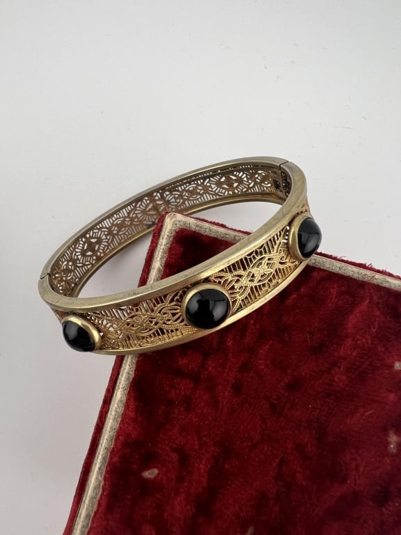 Antique Edwardian Style Gold Fill Bangle Bracelet: Antique Edwardian Style Gold Filled Bangle Bracelet. Hinged bangle bracelet set with three cabochons. Measures just over 2.25 inches across the interior opening.