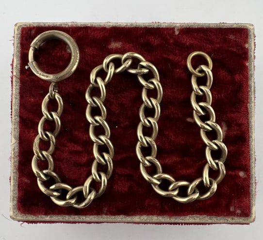 Antique Gold Filled Curb Link Bracelet Chain: Antique Gold Filled Curb Link Bracelet or Watch Chain. With large spring ring clasp. Measures 8 inches in length. Would be great to use as a charm bracelet.
