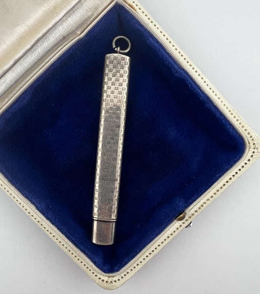 Antique Sterling Silver Chatelaine Case Pendant: Antique Sterling Silver Chatelaine Case Pendant. Necklace pendant or chatelaine pendant that opens to hold sewing needles or a pencil. Hallmarked. Measures 3.5 inches in length.