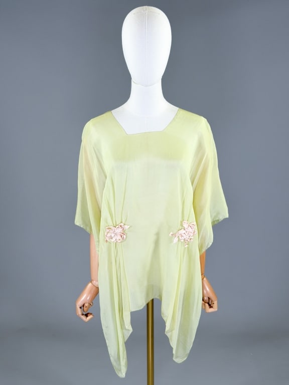 Antique 1920s Silk Floral Ribbon Work Blouse Top: Antique 1920s Silk Floral Ribbon Work Blouse Top having no closures, slides over head, floral details front and back. One size fits most. Measuring 28 inches long. General wear as shown throughout.