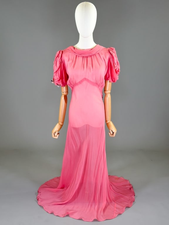 Vintage 1930s Silk Chiffon Bias Puff Sleeve Gown: Vintage 1930s Silk Chiffon Bias Puff Sleeve Gown having side snap closure and floral details at sleeves. Measuring 32-40 inch bust, 24-30 inch waist, 57 inches long, 9 inch sleeve length. General wear