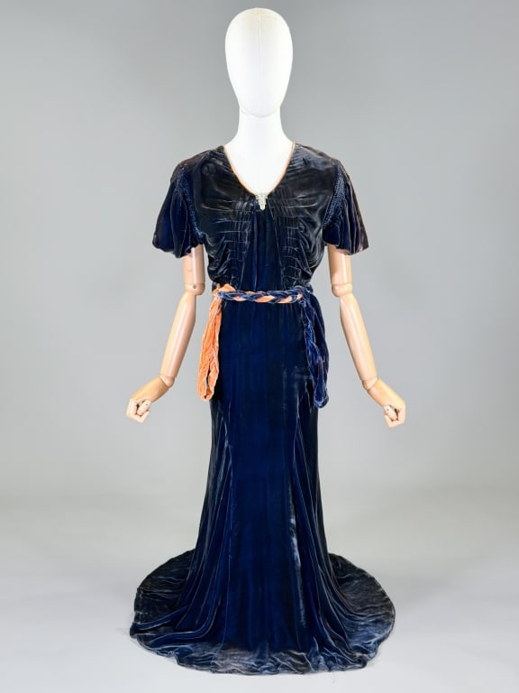 Vintage 1930s Silk Velvet Art Deco Evening Gown: Vintage 1930s Silk Velvet Art Deco Evening Gown having side snap closure, bias cut throughout with stretch and belt at waist. Measuring 34-38 inch bust, 26-32 inch waist, 54 inches long, 9 inch sleeve