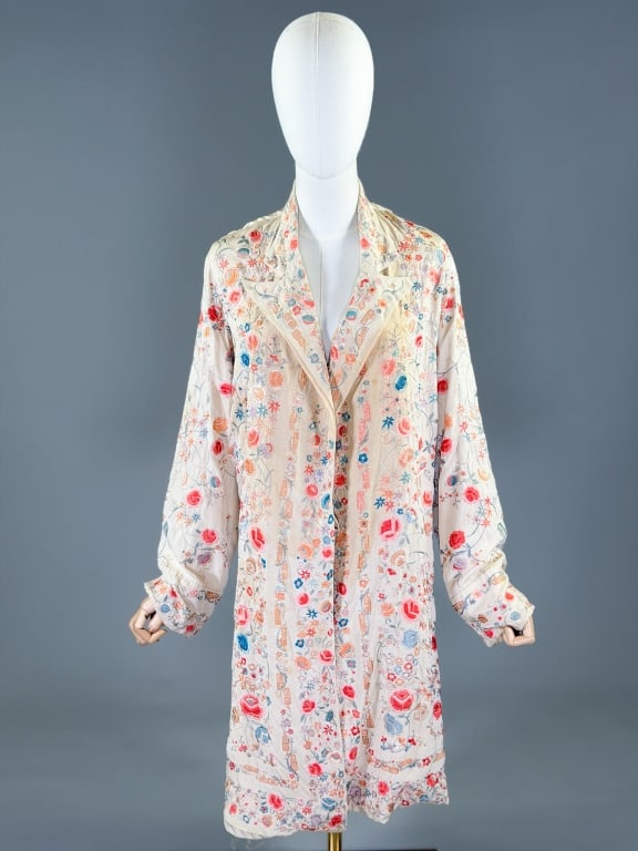 Antique 1920s Silk Embroidered Floral Robe Jacket: Antique 1920s Silk Embroidered Floral Robe Jacket having embroidery throughout in Chinese pattern with Greek key details. Measuring free bust and waist, 40 inches long, 23 inch sleeve length. General 