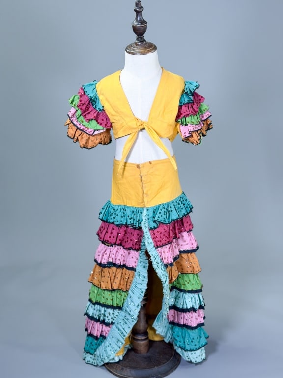 Vintage 1930s Sequin Costume Kids 2PC Set: Vintage 1930s Sequin Costume Kids Two Piece Set having top with adjustable tie closure. Measuring 8 inches long, 6 inch sleeve length. Skirt having hook closure. Measuring 20 inch waist, 25 inches lon