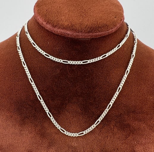 Vintage Italian Sterling Figaro Necklace Chain: Vintage Italian Sterling Silver Figaro Link Necklace Chain. Hallmarked 925 and stamped ITALY. New old stock from a jewelry store liquidation. Measures 24 inches in length.