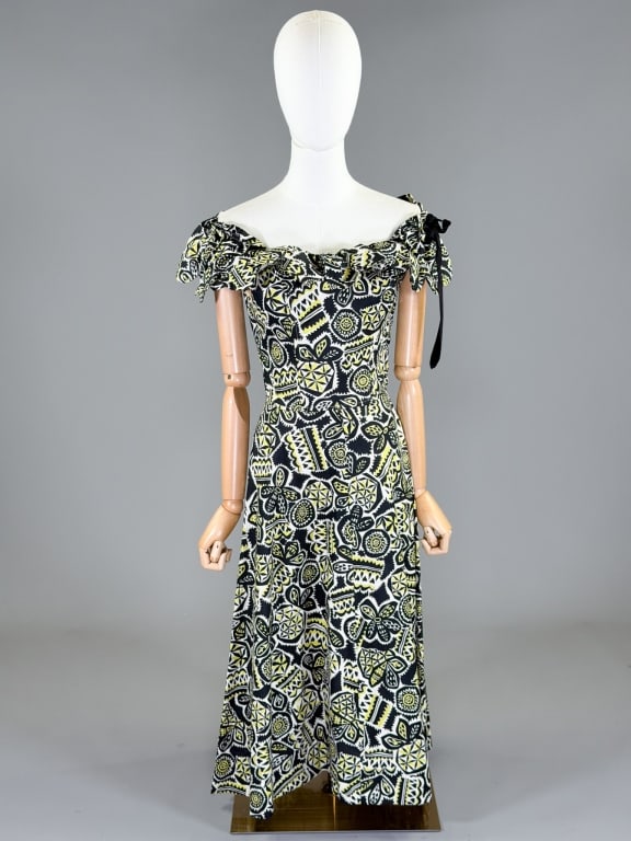 Vintage 1950s Hawaiian Cotton Day Dress: Vintage 1950s Hawaiian Cotton Day Dress having drawstring neck with side zip closure. Measuring 34 inch bust, 26 inch waist, 48 inches long, 5 inch sleeve length. General wear as shown throughout.