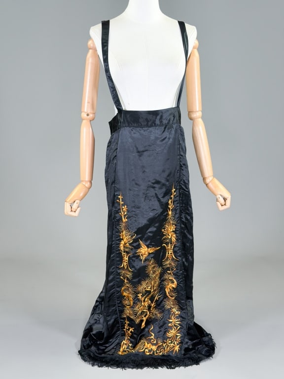 Vintage 1940s Satin Embroidered Chinese Skirt: Vintage 1940s Satin Embroidered Chinese Skirt having adjustable shoulder straps. Measuring 40 inch waist, 50 inches long. General wear as shown throughout.