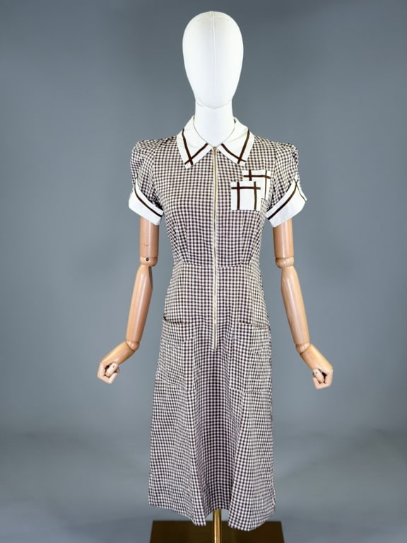 Vintage 1940s Cotton Plaid Waitress Uniform Dress: Vintage 1940s Cotton Plaid Waitress Uniform Dress having zip front closure with front pockets. Marked size 30. Measuring 36 inch bust, 26 inch waist, 41 inches long, 8 inch sleeve length.